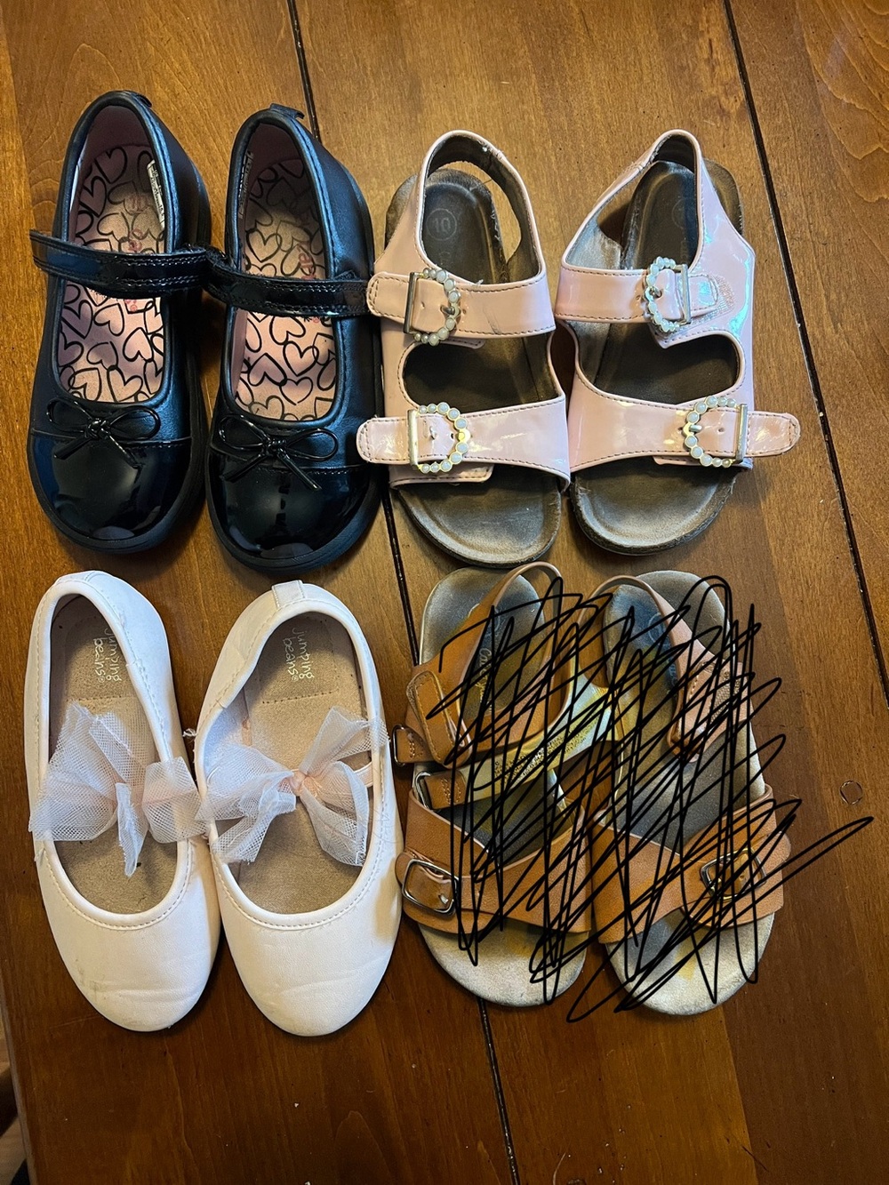 Bundle of sandals and dress shoes